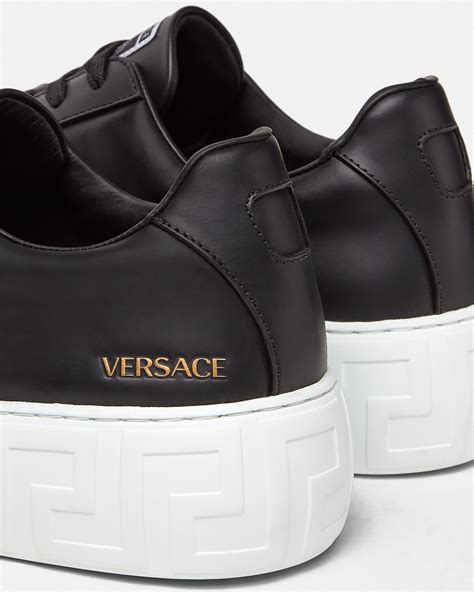 versace collection metal coin slip on sneaker|versace greca sneakers men.